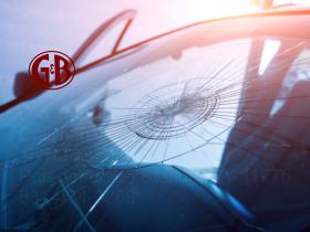 Smashed car windshield needing Auto Glass Replacement